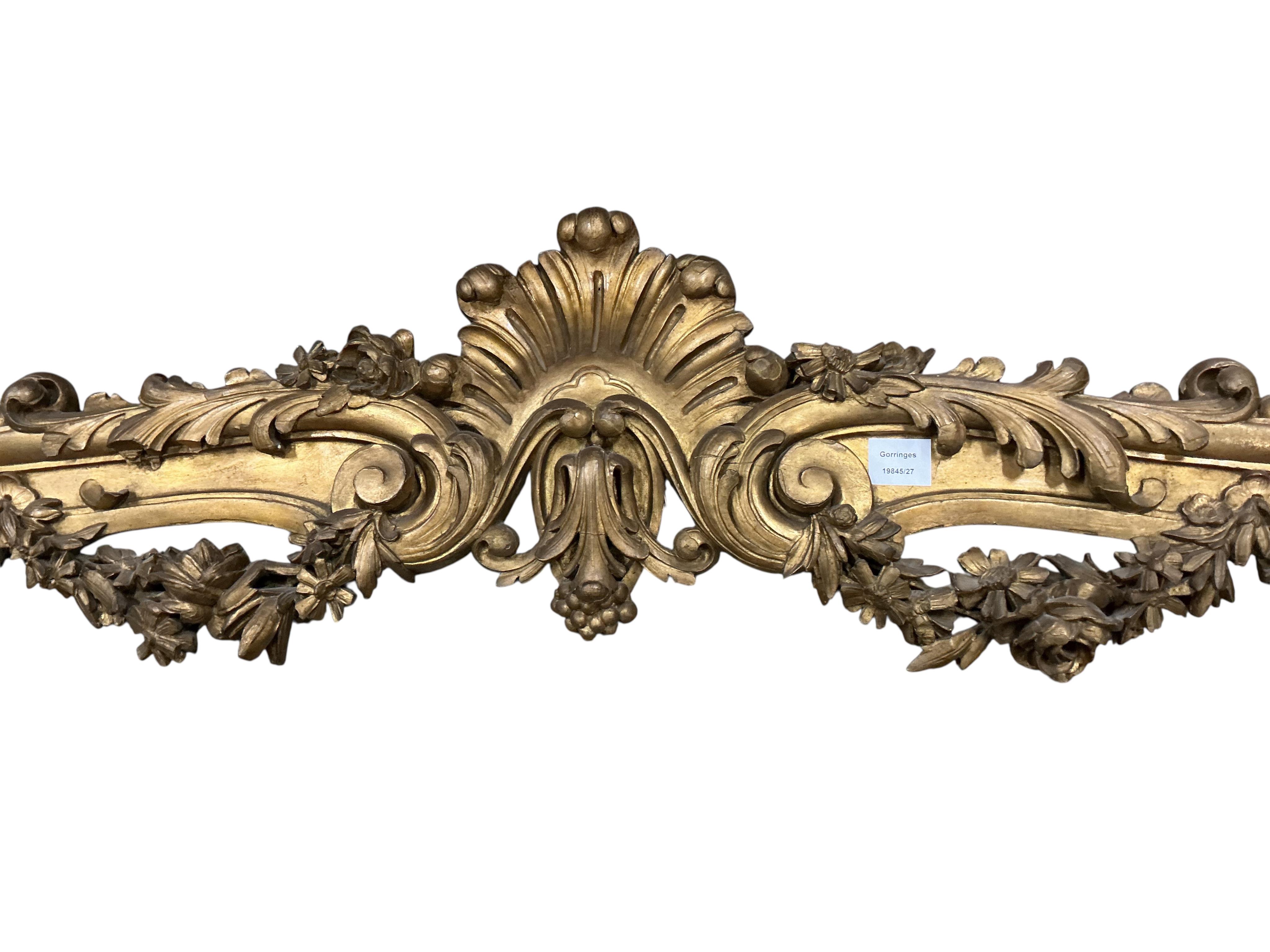 A Victorian carved giltwood pediment, length 200cm